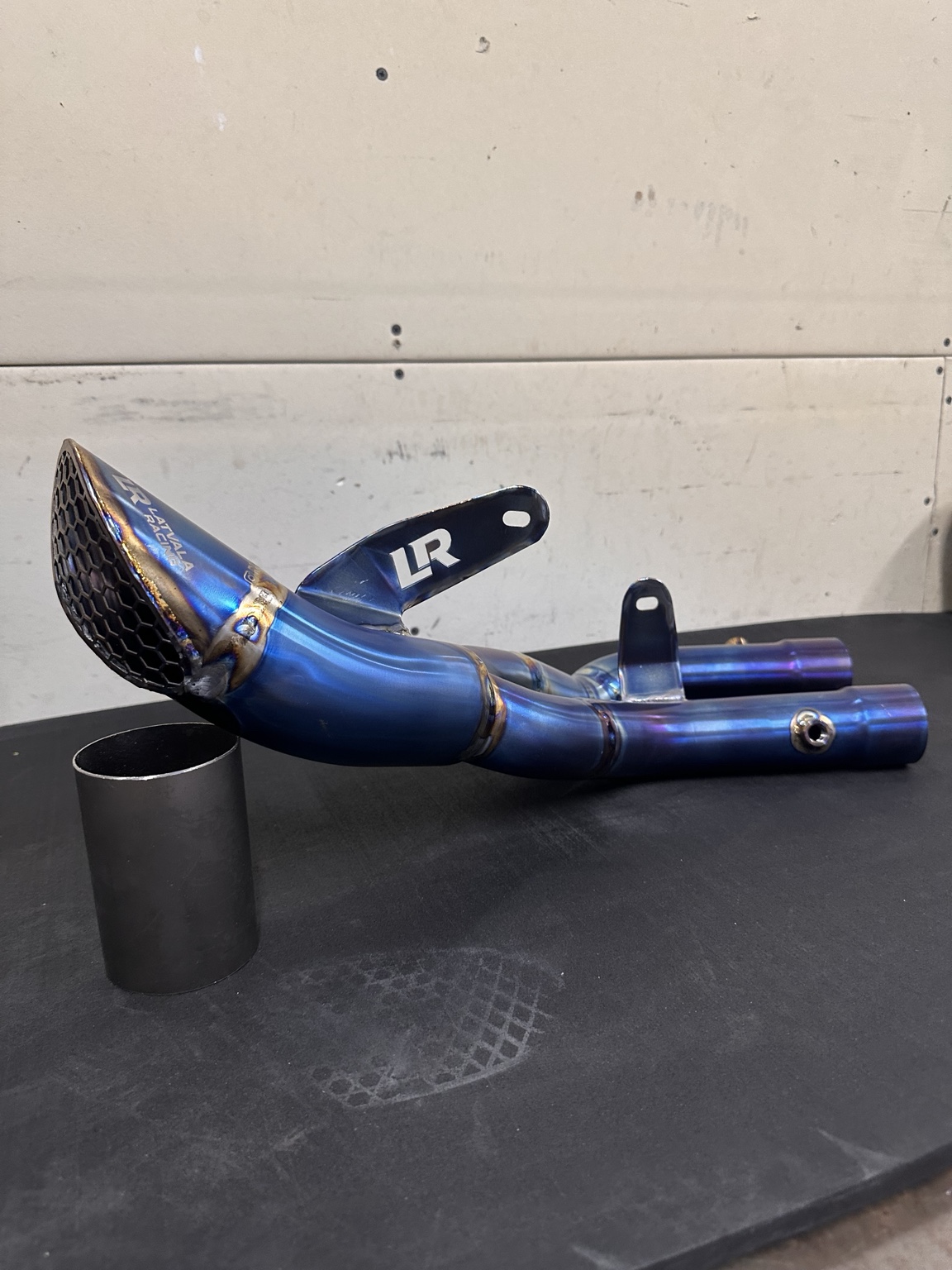 Latvala Racing mid length exhaust with blue titanium finish