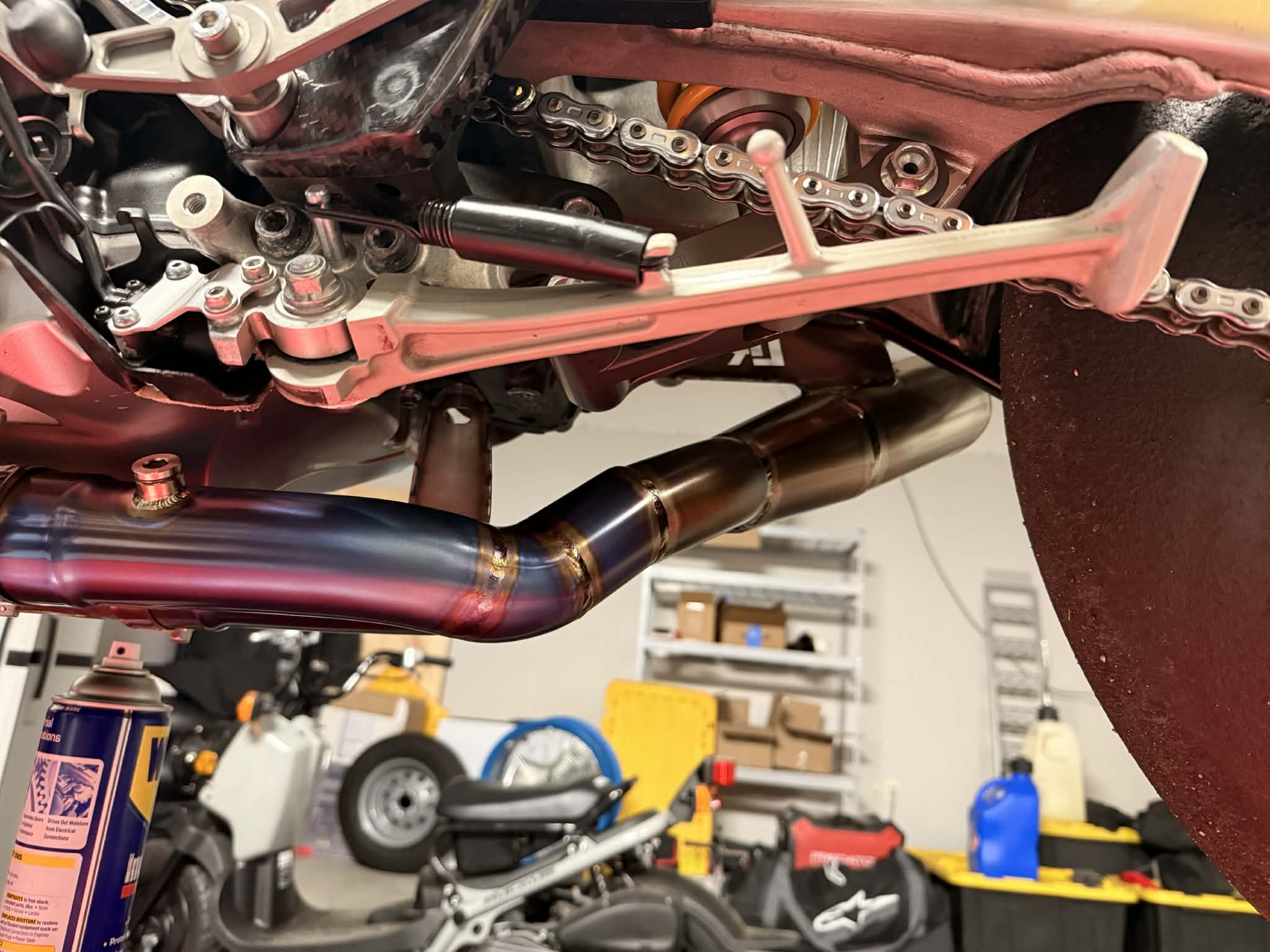 Closeup of titanium exhaust welds and tubing color