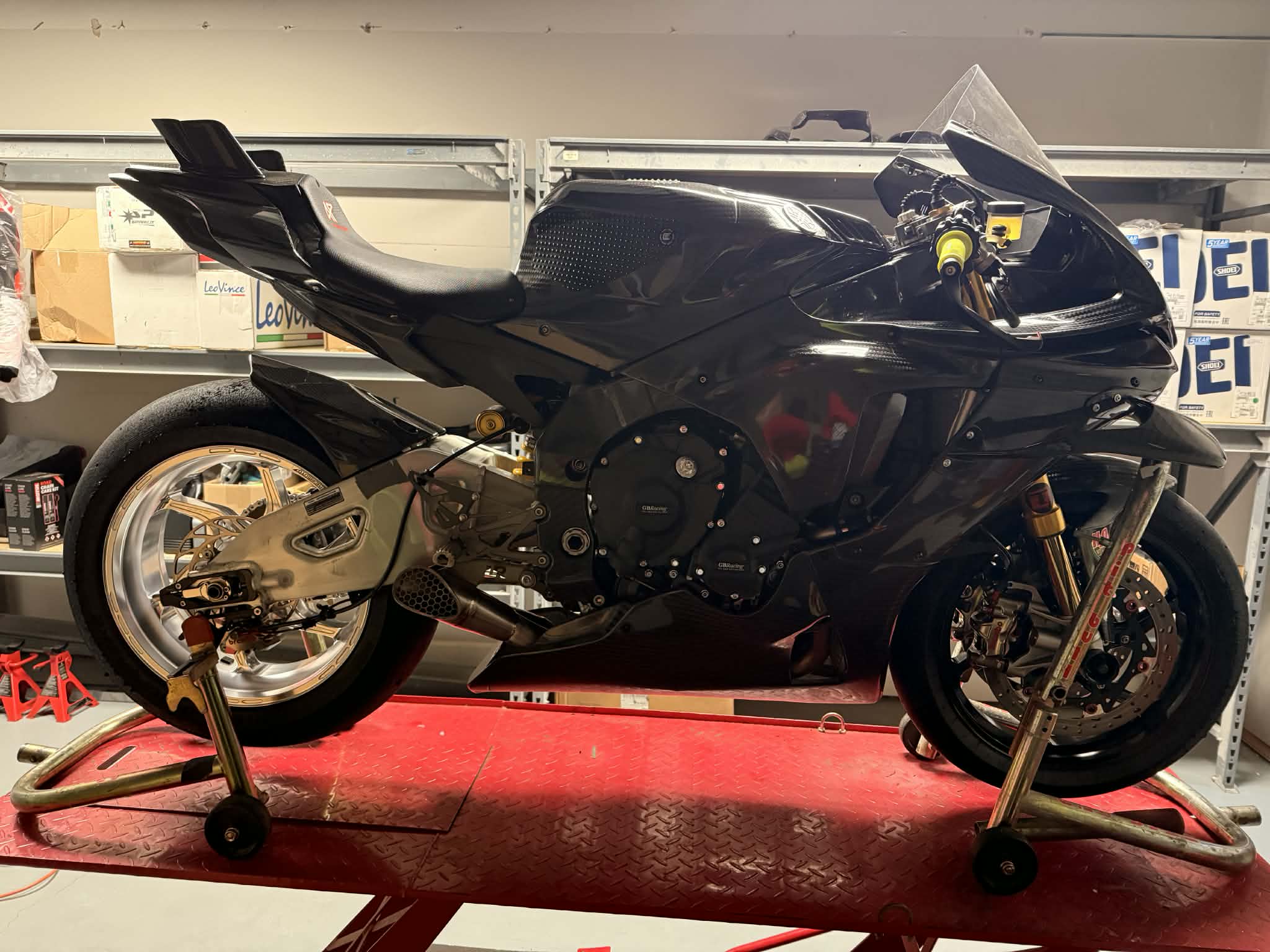 Black Yamaha R1 with Latvala Racing short exhaust